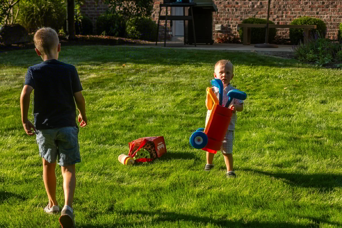 children playing on a lawn can contribute to compaction over time