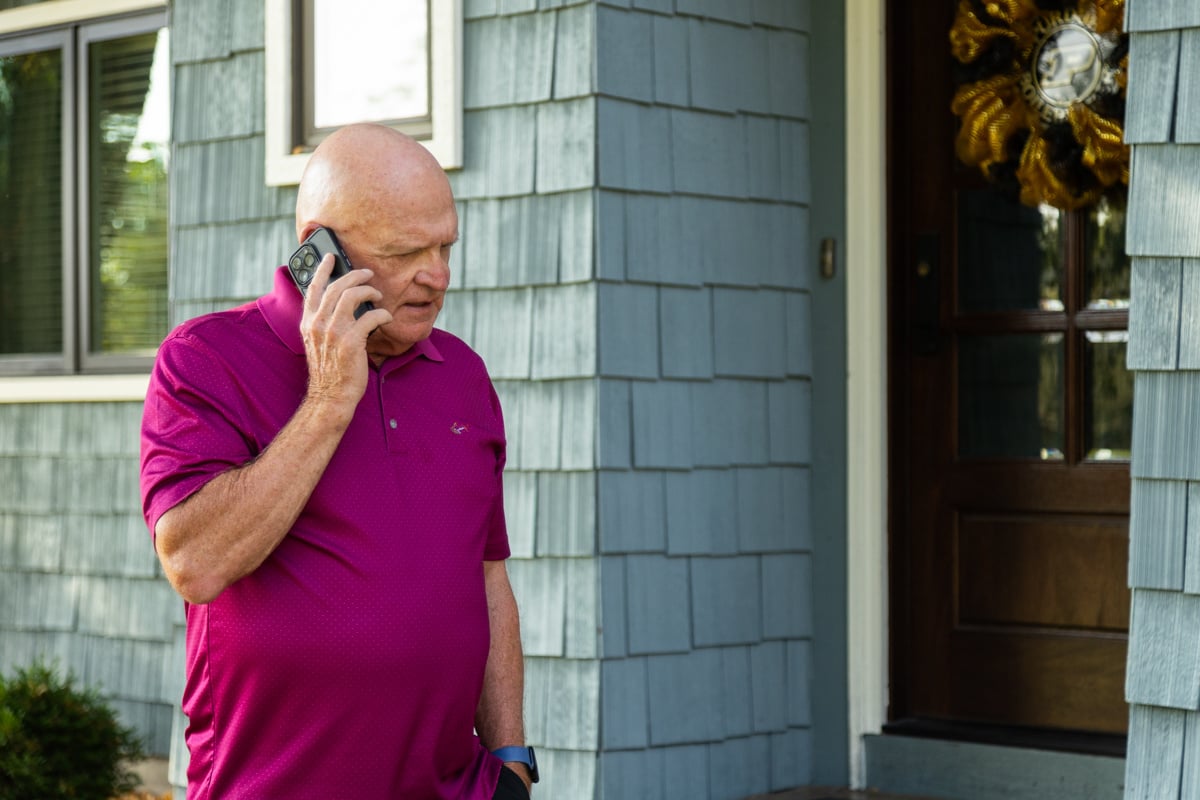 indiana homeowner talking to a mosquito control company on the phone