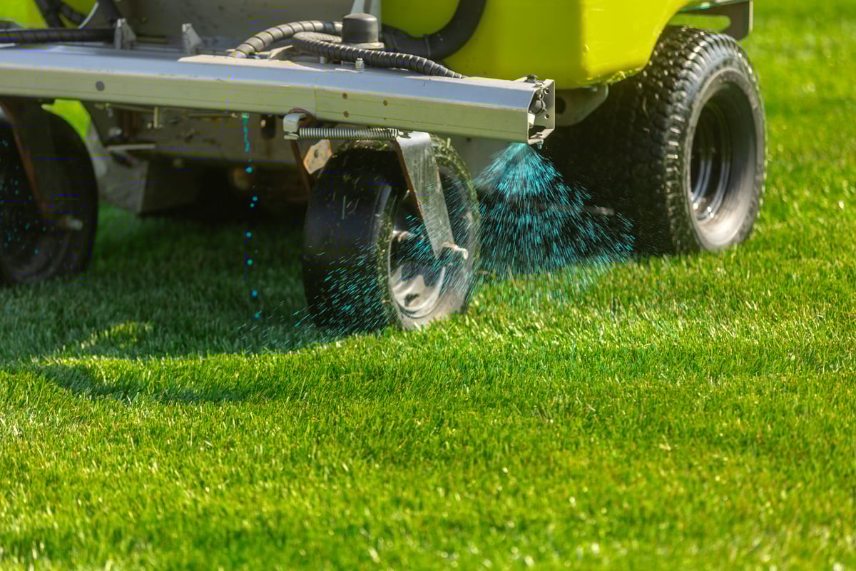 liquid fertilizer mixed with weed control products