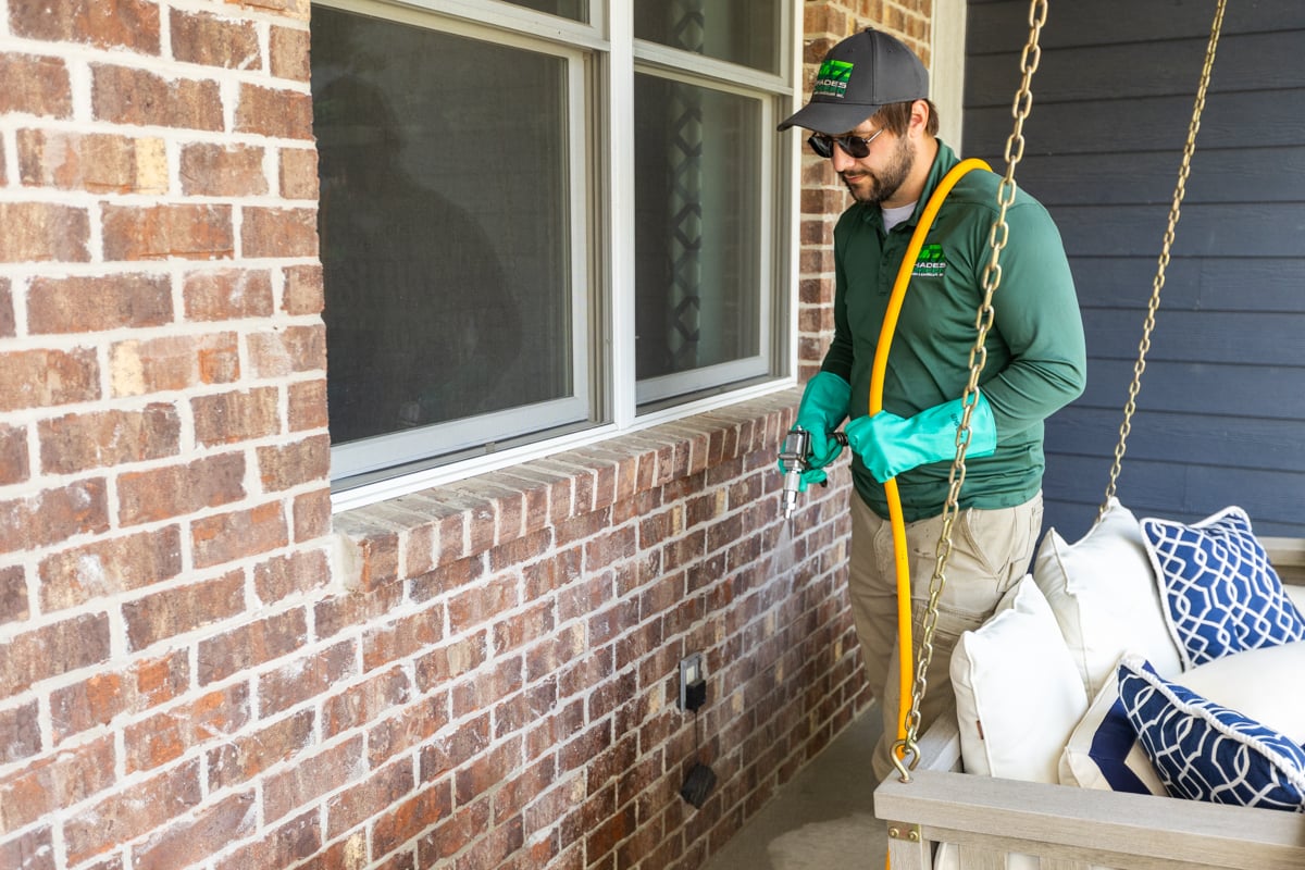 perimeter pest control application around the front of a home