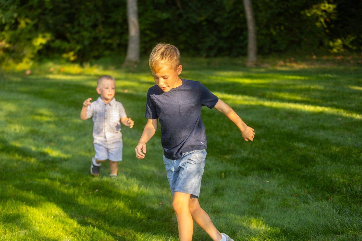 children playing in a pest-free lawn in Westfield, IN